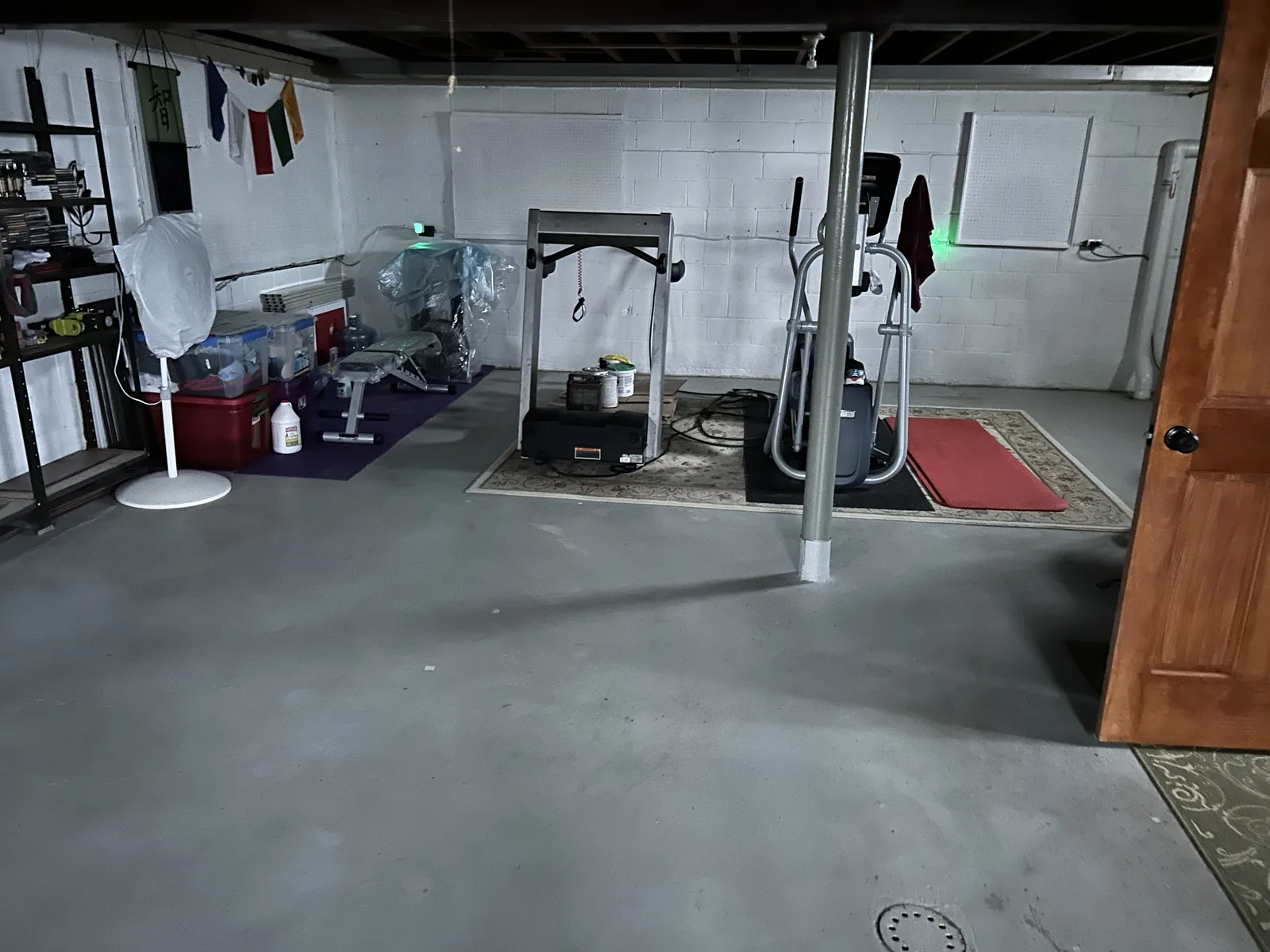 Open lower level with new wood-look flooring