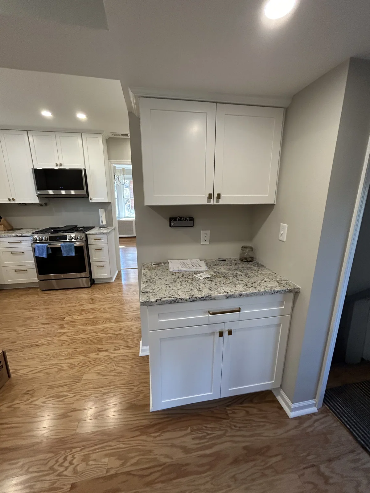 Completed kitchen remodel with hardwood floors